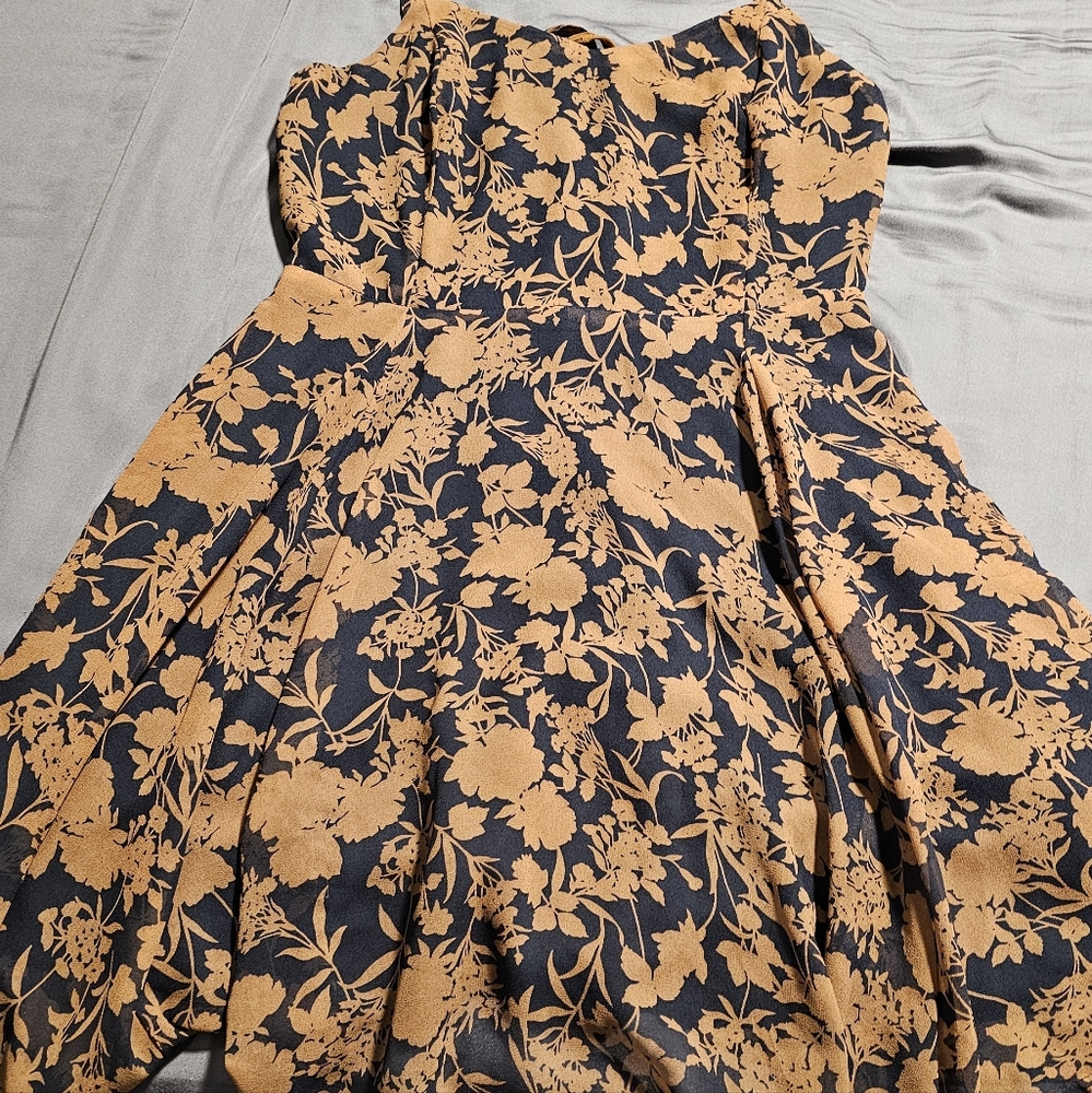 The Brand: French kiss, Size:M Color: Is a mix of brown and black